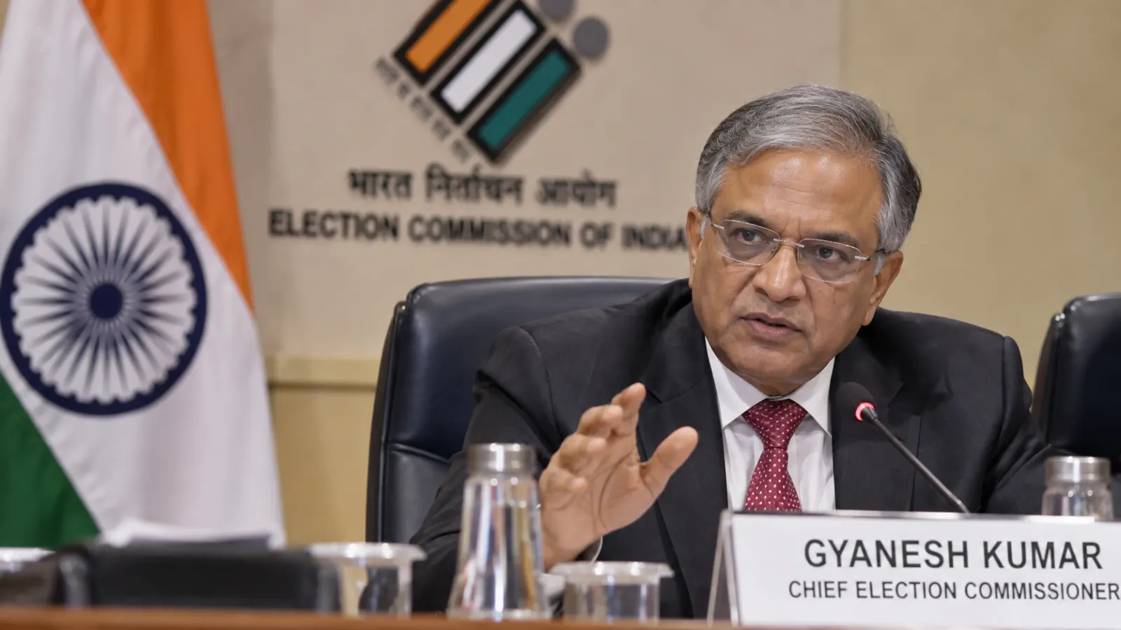 Chief Election Commissioner Gyanesh Kumar at an Election Commission setting as scrutiny grows over voter-roll revisions and internal objections.