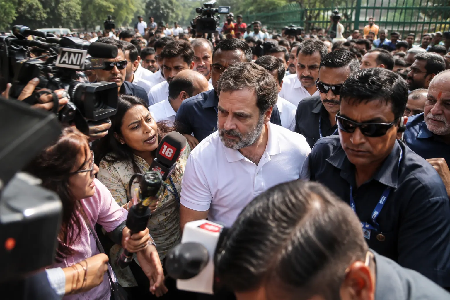 Rahul Gandhi amid journalists and supporters during an Opposition protest in Delhi.