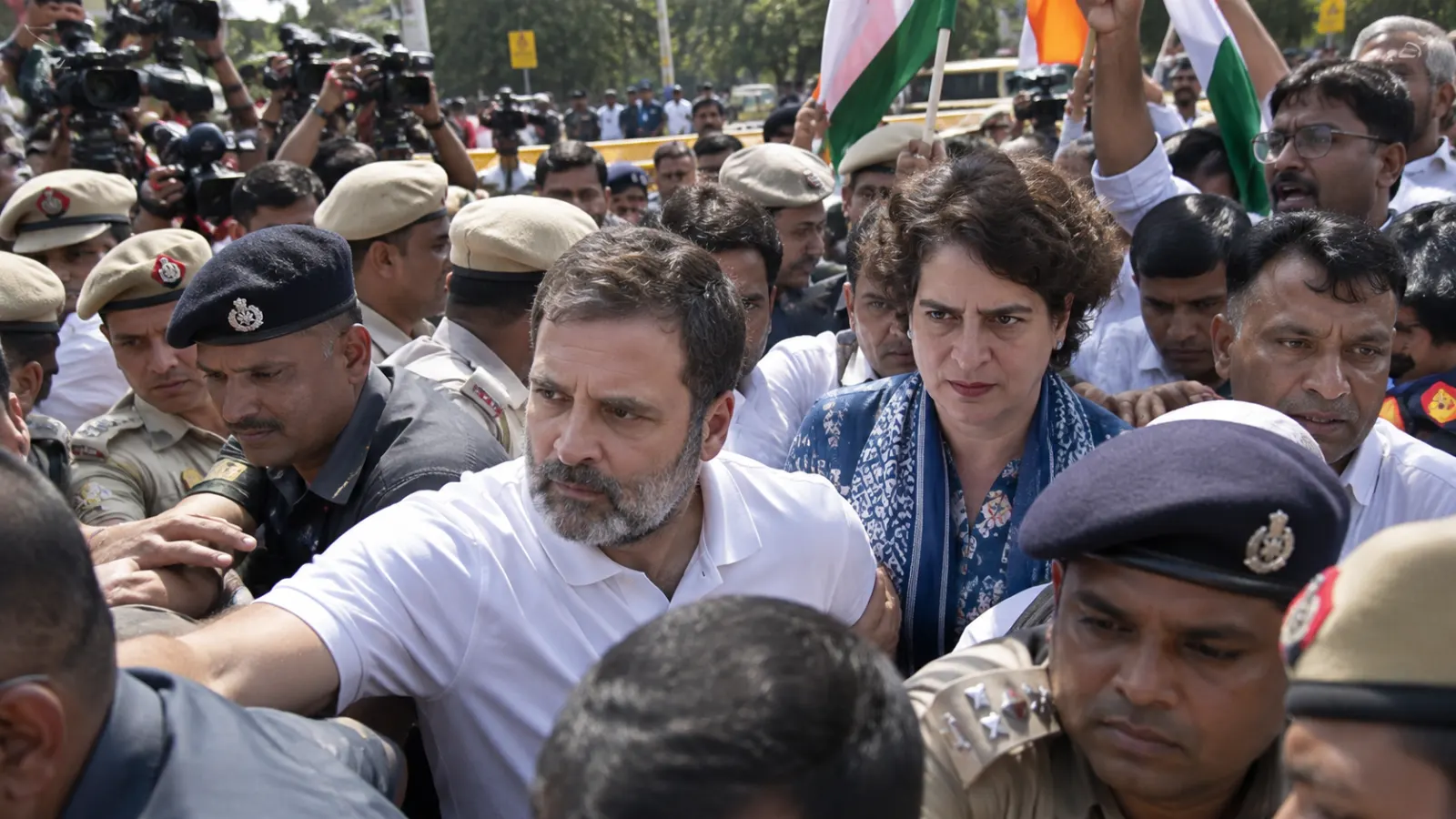 Rahul Gandhi and Priyanka Gandhi during an Opposition protest in New Delhi against Chief Election Commissioner Gyanesh Kumar before being detained by police.