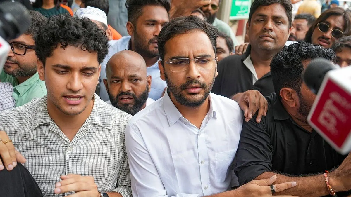 CJP leaders Saurav Das and Ashutosh Ranka during the Delhi protest controversy, with police presence linked to their detention and subsequent five-day judicial custody in Tihar Jail.